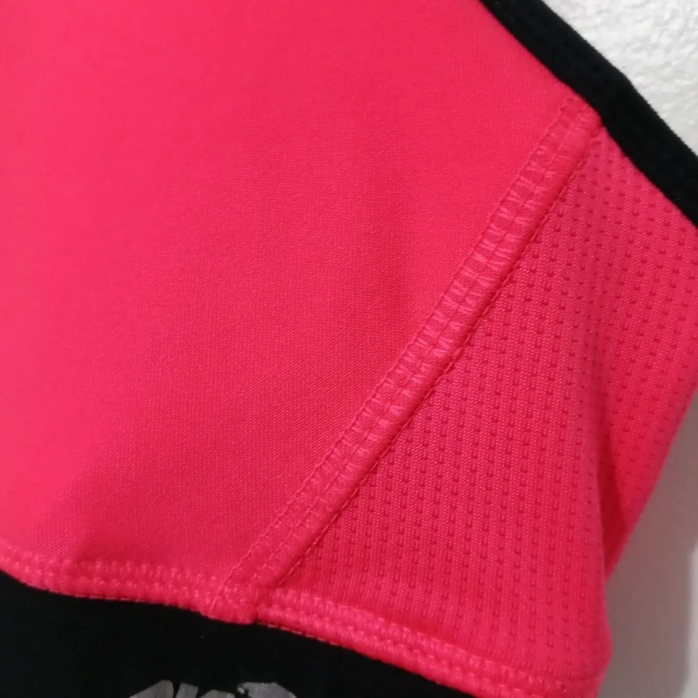 Avia pink black lined racerback sports bra mesh sides reflective logo M